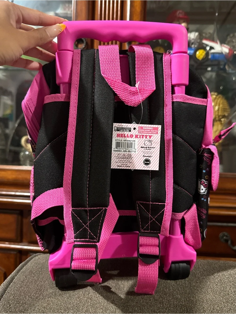 Hello Kitty Black and Pink Rolling Luggage